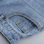 Jeansowa Spódnica Z Asymetrycznym Zapięciem - Vesporia